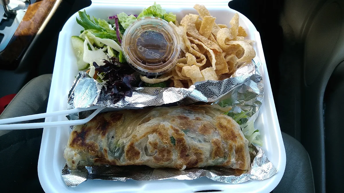 Peking Duck Wrapped in Crepes