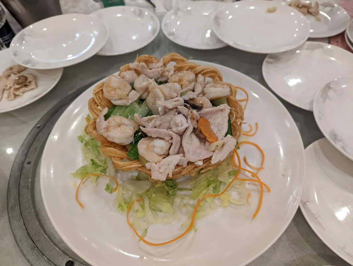 Sauteed Prawns and Scallops in Phoenix Nest