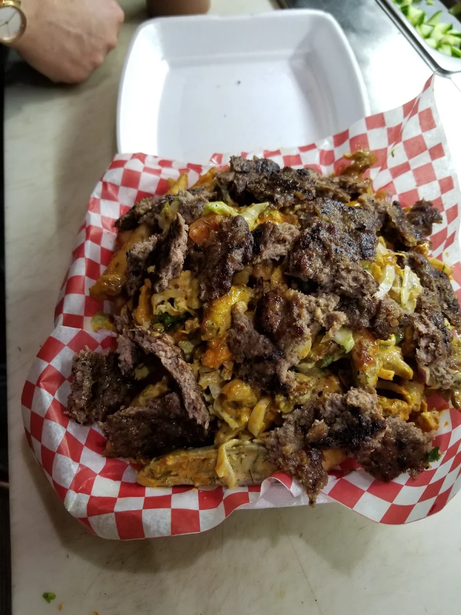 Shawarma Plate Topped with Their Beef Burger Patty