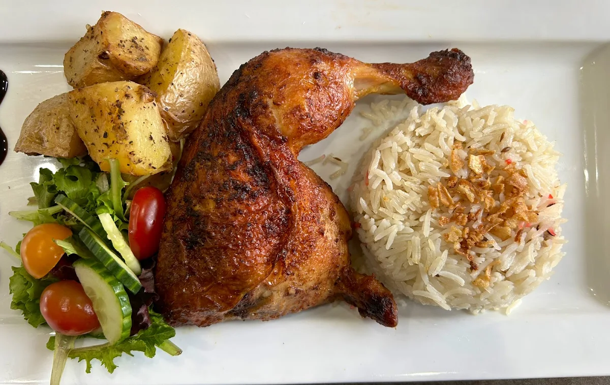 Half Chicken with Rice Potato Salad or Fries