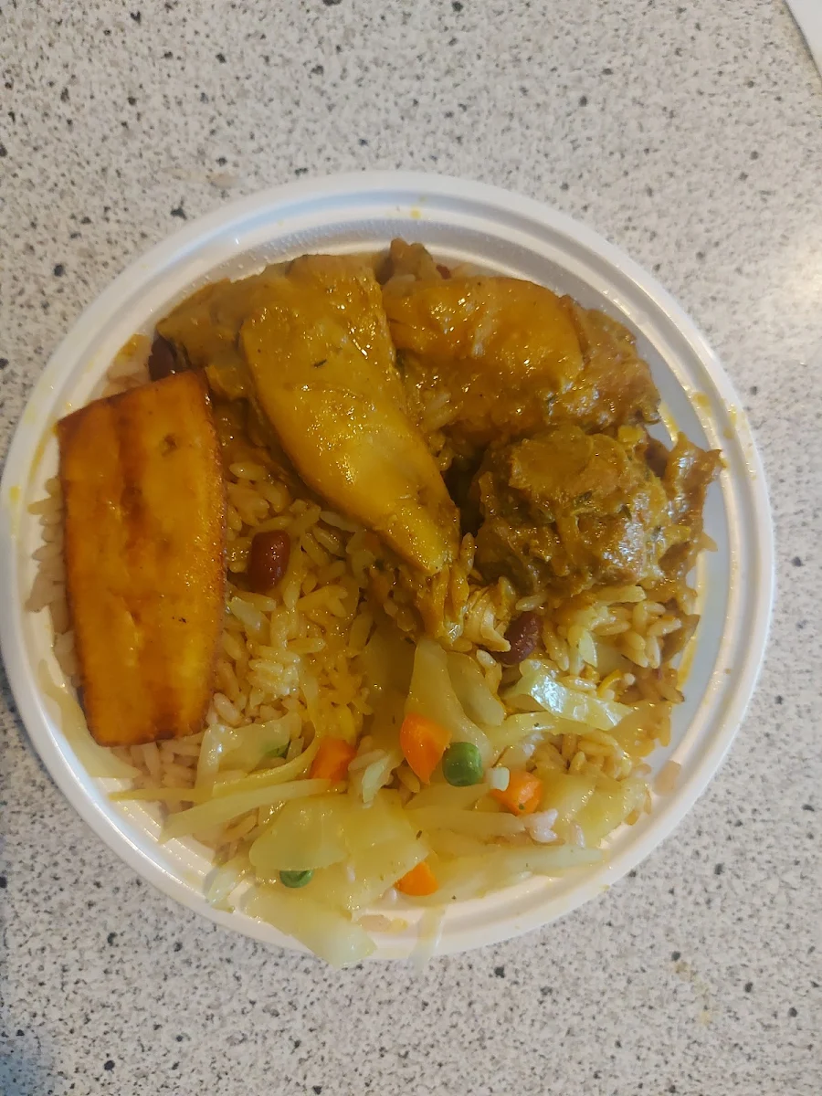 Curry Chicken Rice and Peas Lantain Fried Plantain and Mixed Vegetables