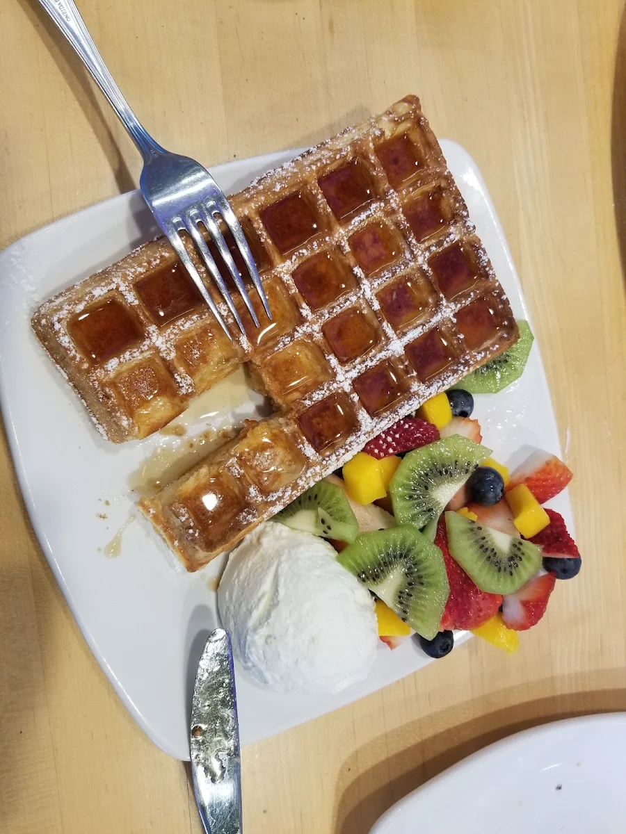 Waffel with Maple Syrup Whipping Cream and Seaonal Fruits