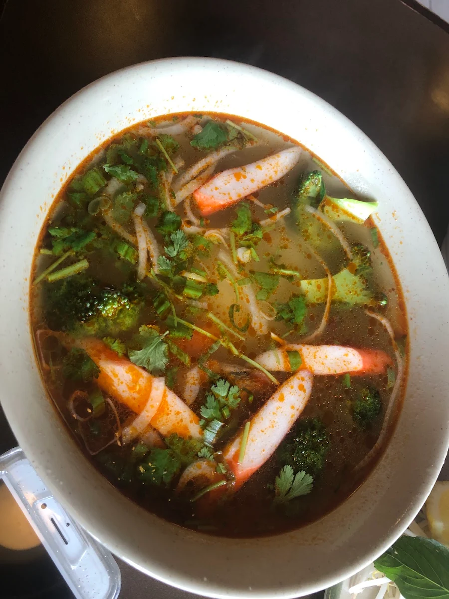 Seafood Noodle Soup in Hot & Sour Soup Prawns Crab Meat Squid & Veggie