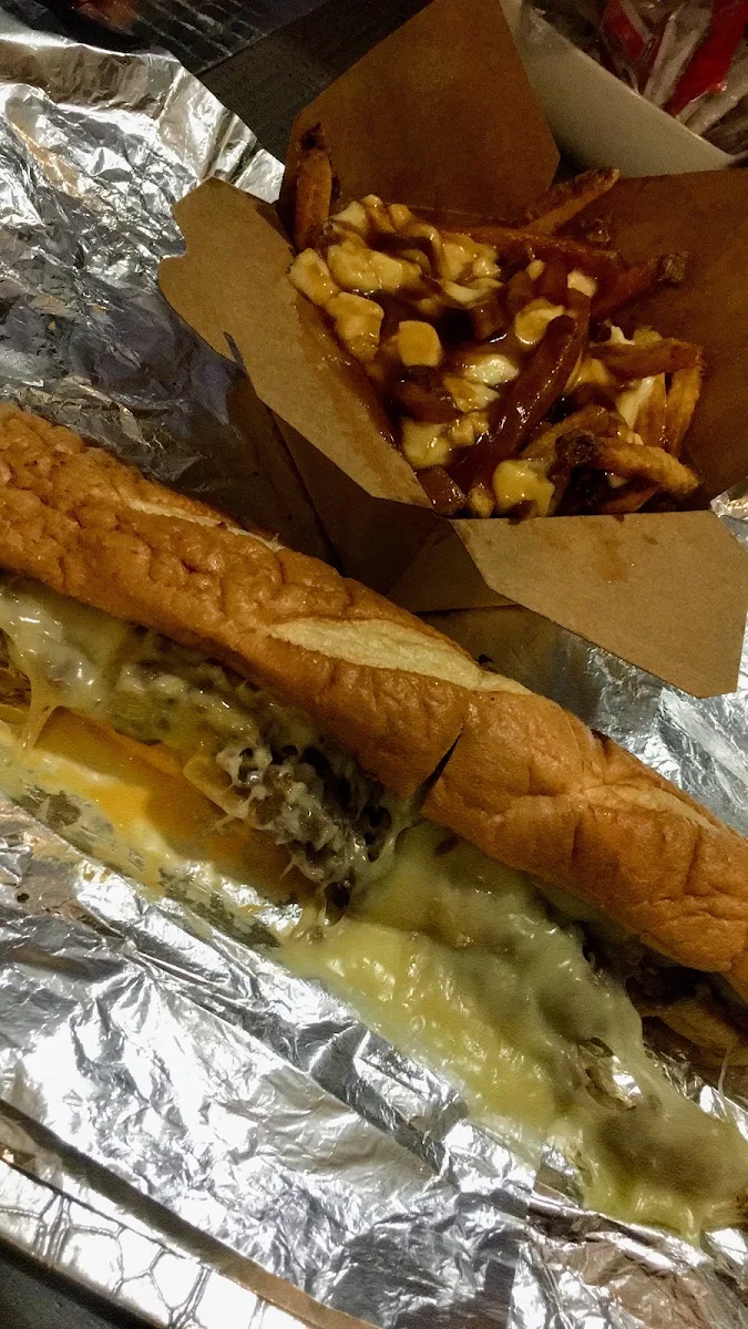 Philly Cheese Steak Sandwich and Poutine