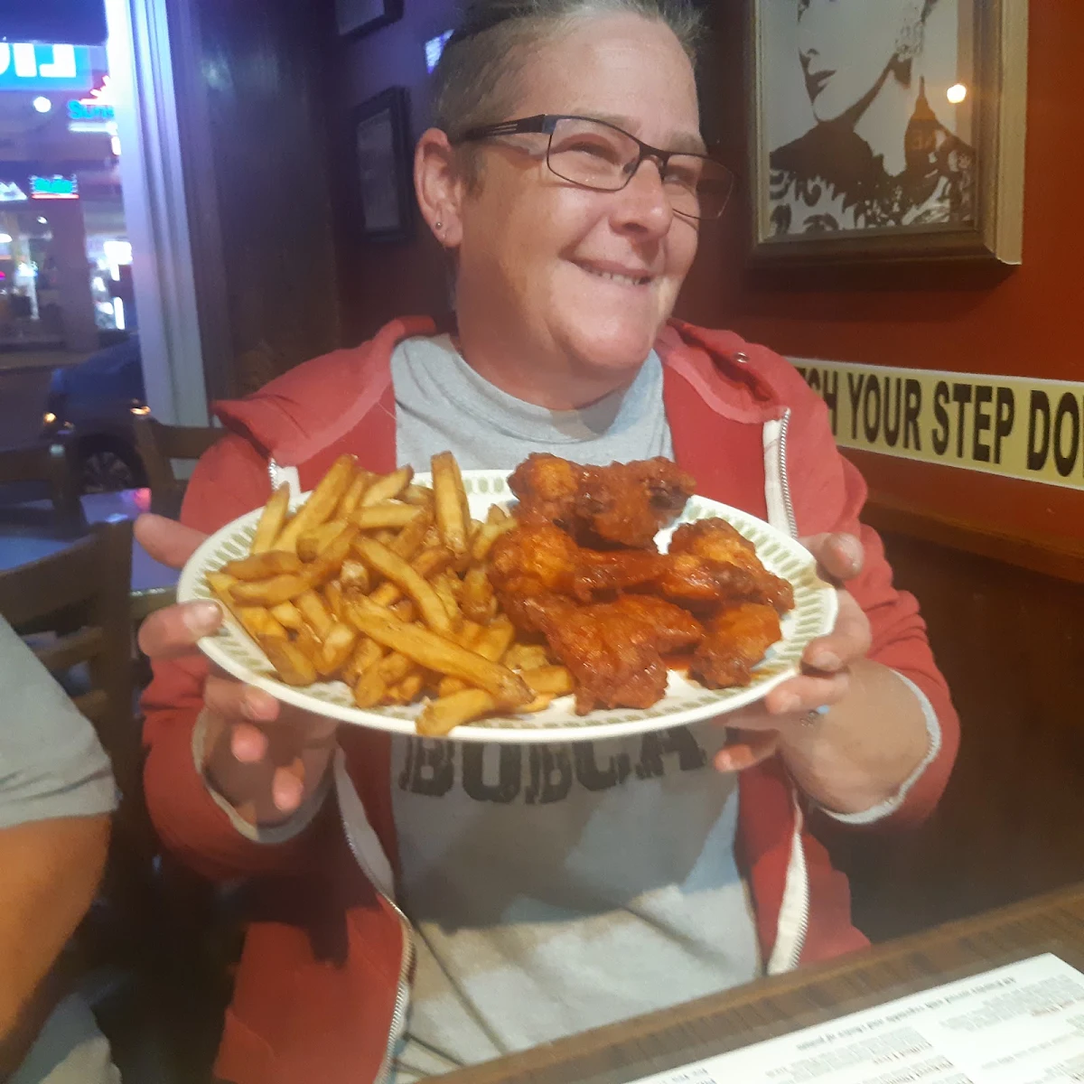 Hot Chicken Wings and Piping Hot Golden Brown French Fries