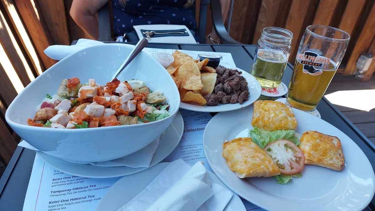 Beef Tenderloin and Ceasar Salad with Cajun Chicken Breast and Garlic Bread