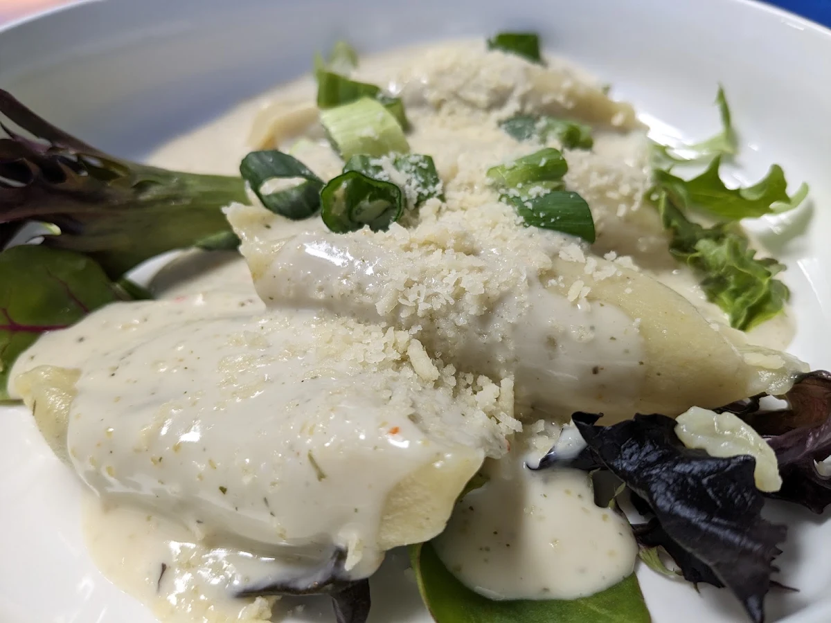 Mushroom Ravioli in White Wine Cream Sauce
