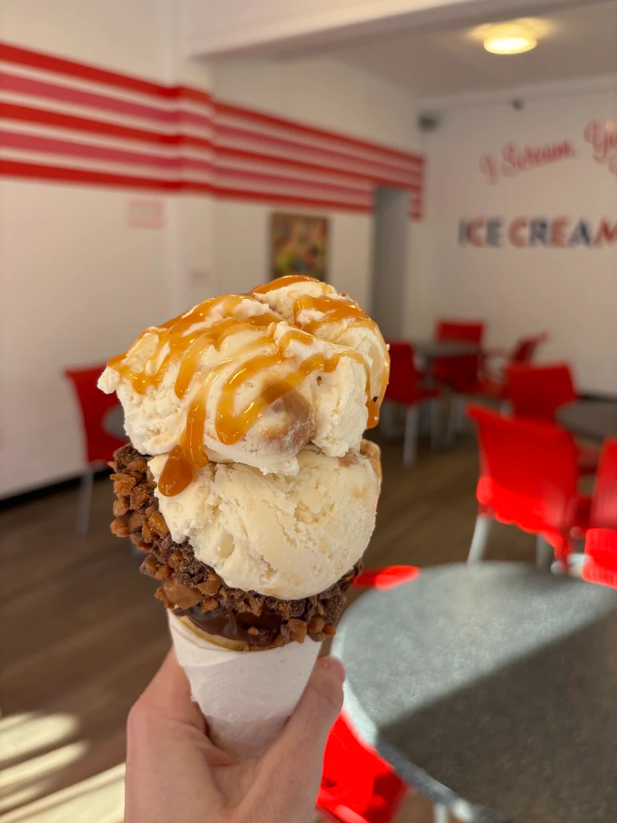 Salted Caramel with Candied Cashew Ice Cream in Skor Bar Waffle Cone Caramel Drizzle on Top