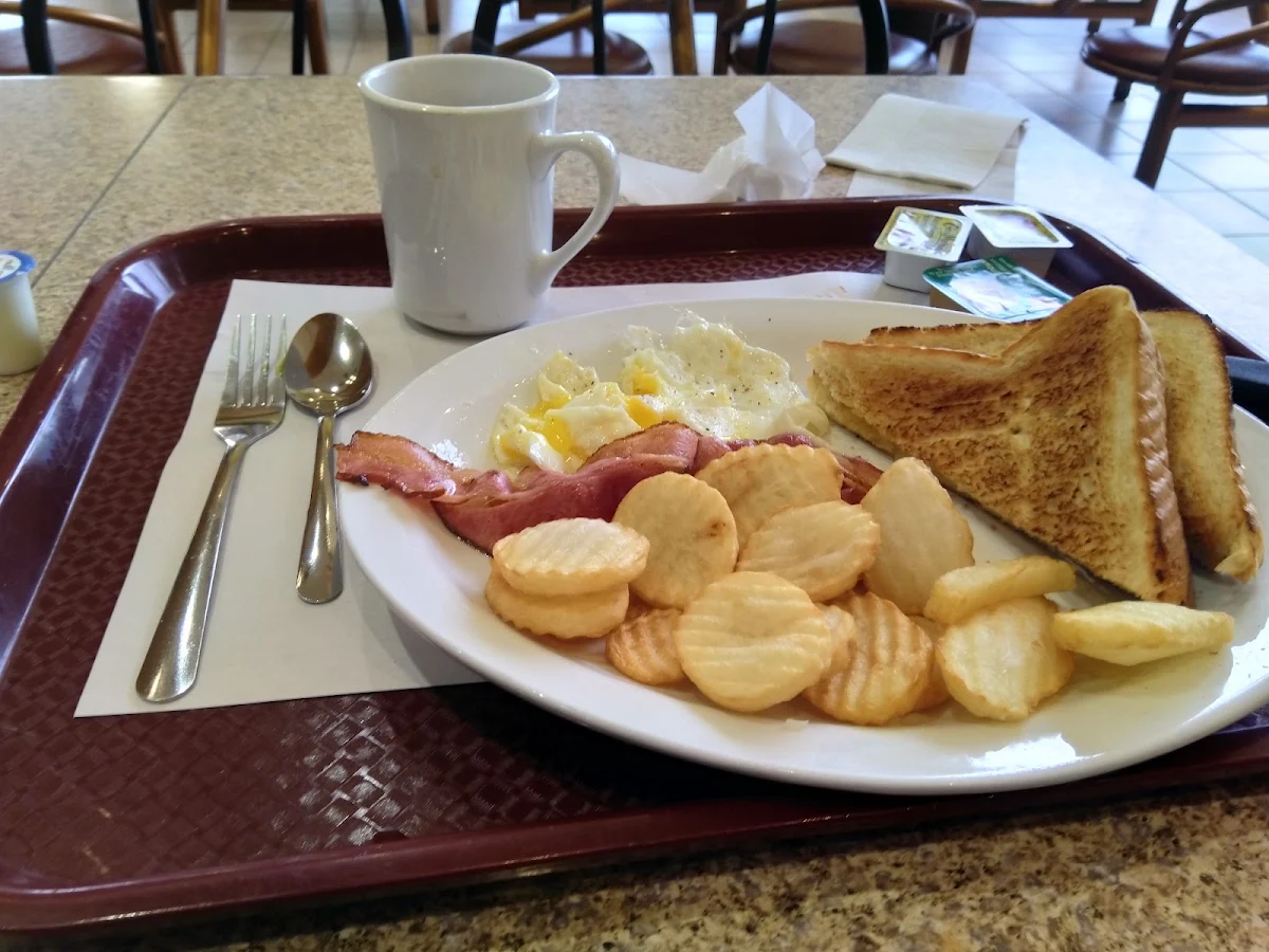 Breakfast with Eggs Bacon Potatoes and Toast