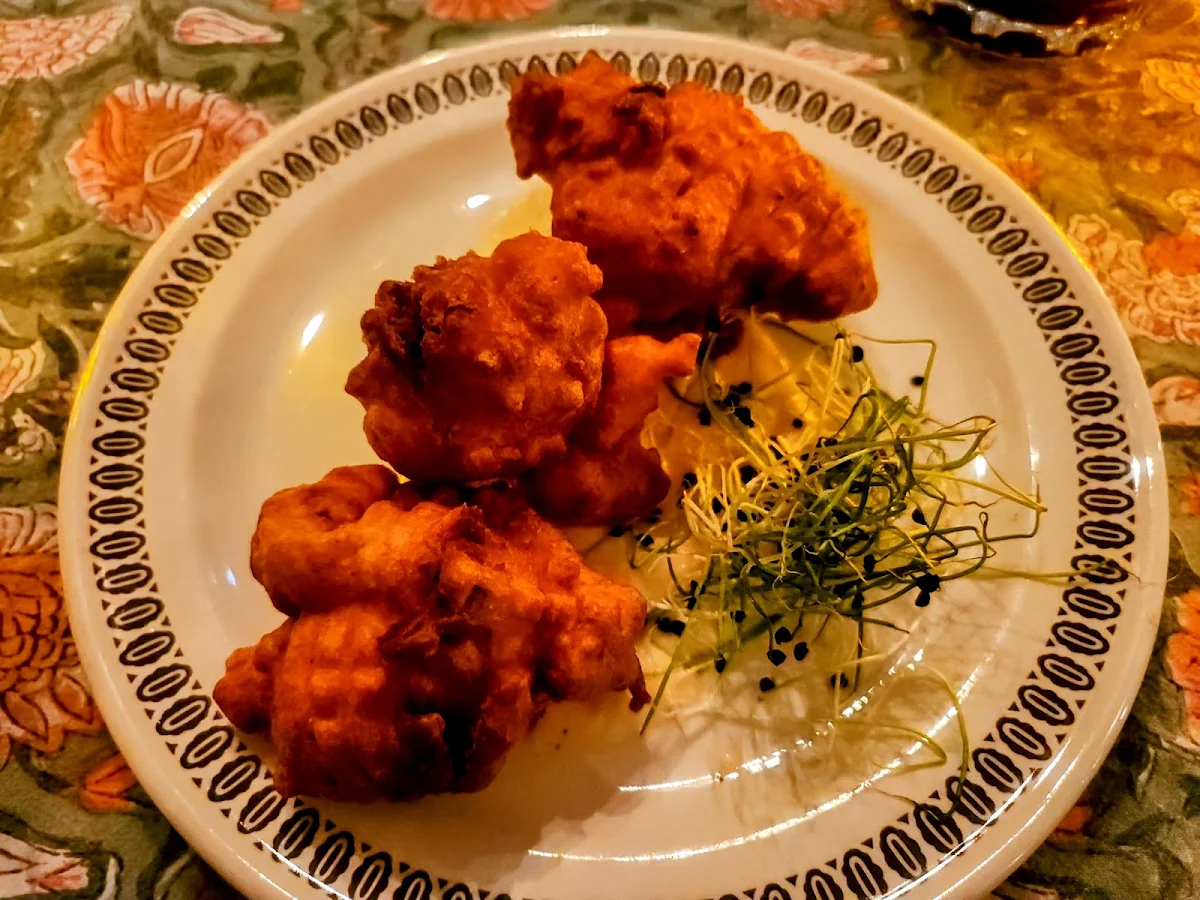 Perch Fritters Old Bay Aioli and Onion Sprouts