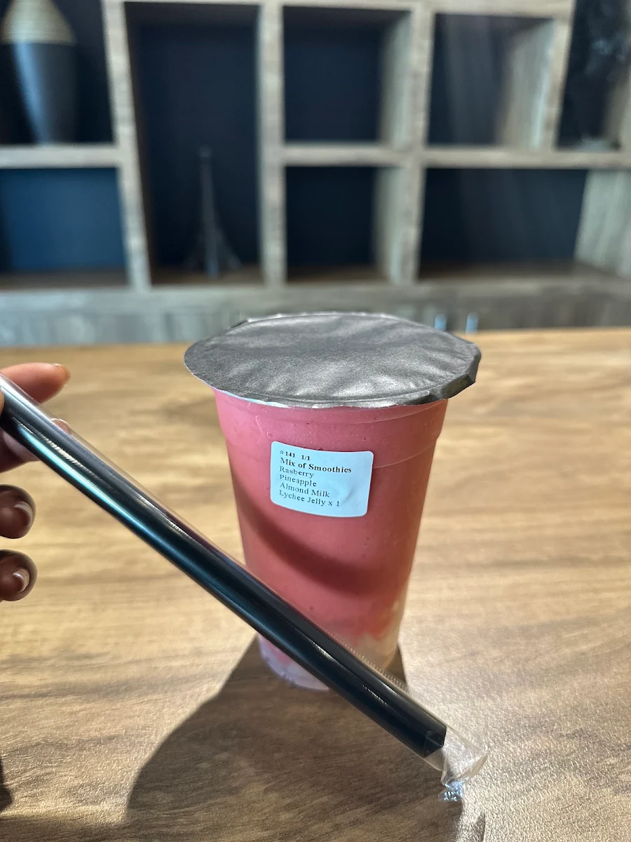 Raspberry Pineapple Smoothie Made with Almond Milk and Topped with Lychee Jelly