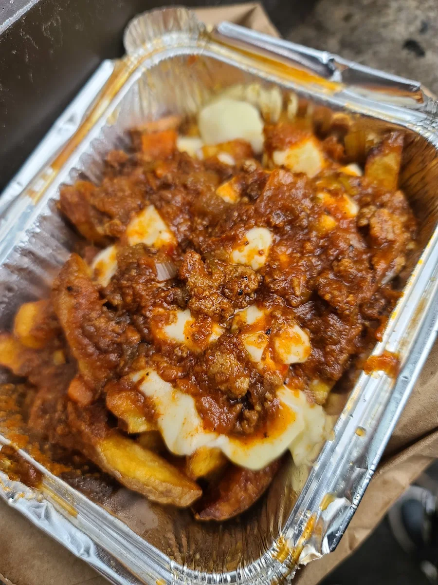 Italian Poutine with House Made Bolognese Sauce
