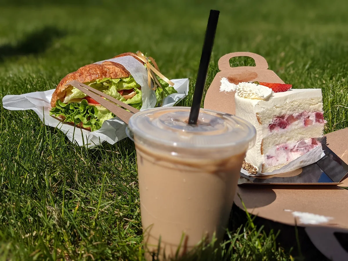Ham and Cheese Croissant Sandwich Strawberry Shortcake and Iced Toffee Nut Latte