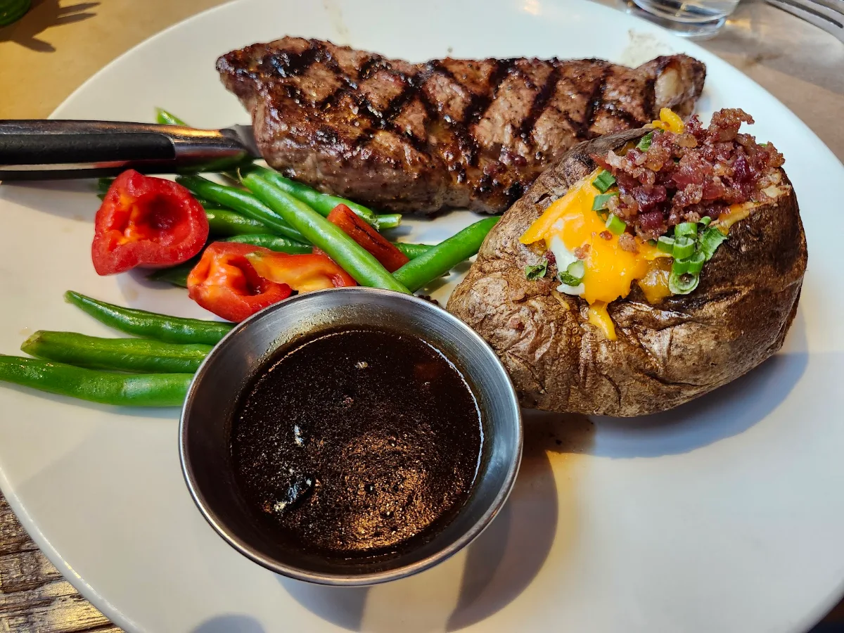 Classic NY Steak with Loaded Baked Potato