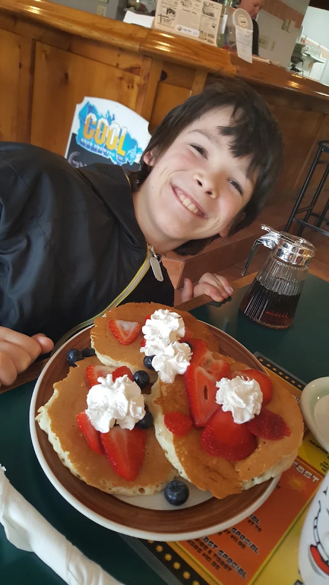 Pancakes with Whip Cream and Strawberries