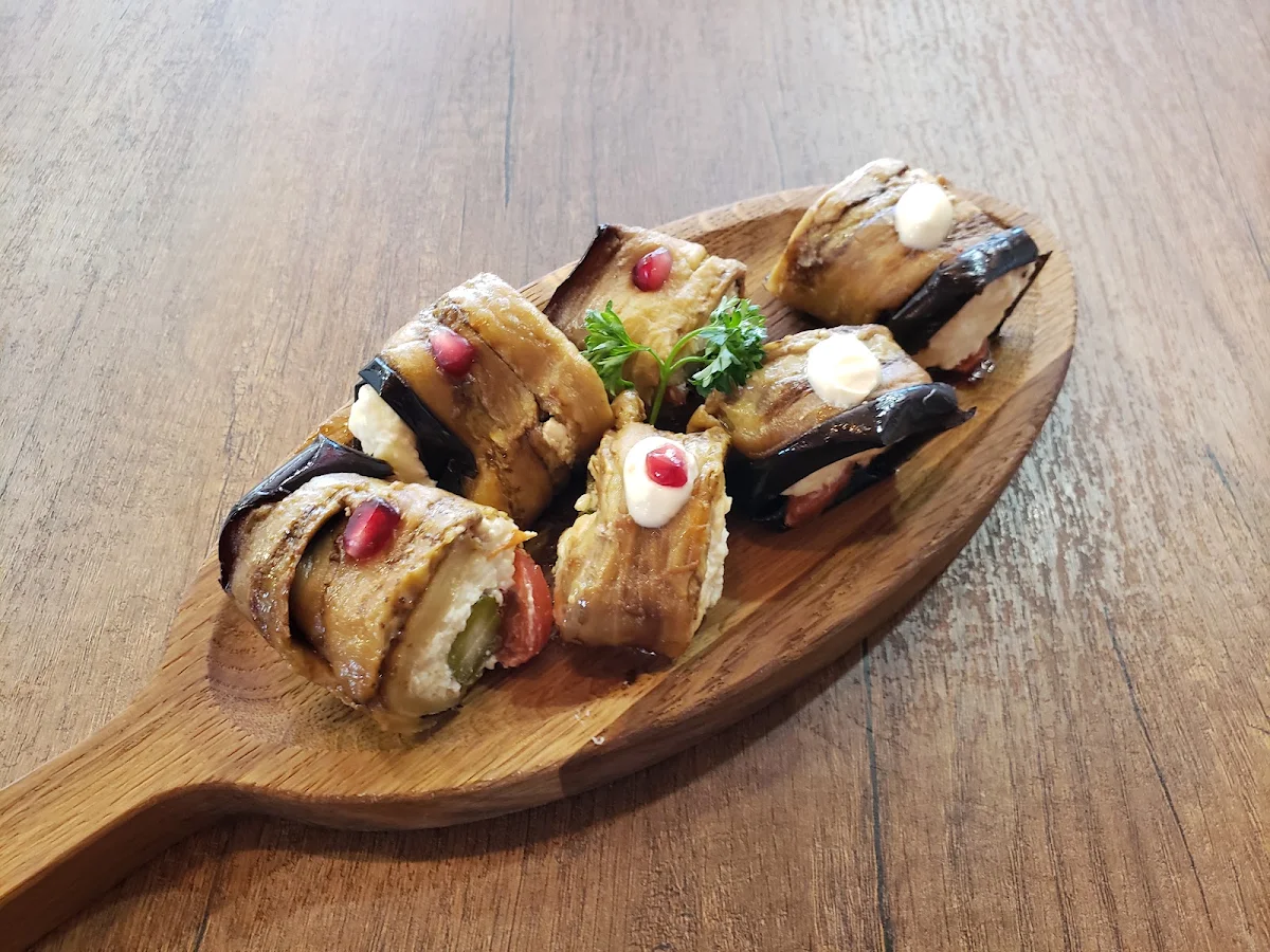 Wrapped Fried Eggplants with Cream and Garlic Sauce