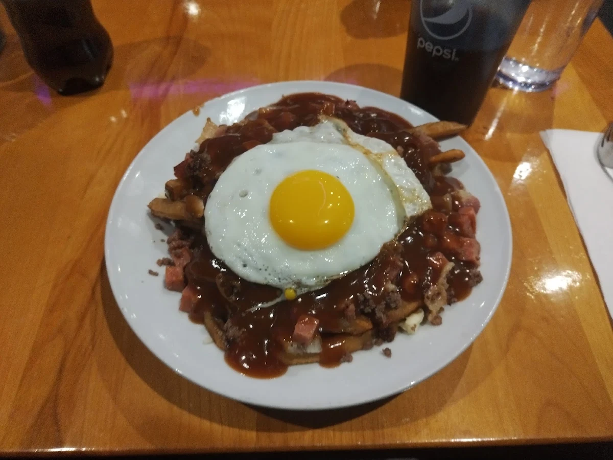 Custom Made Large Poutine with Bacon Ground Beef and Eggs
