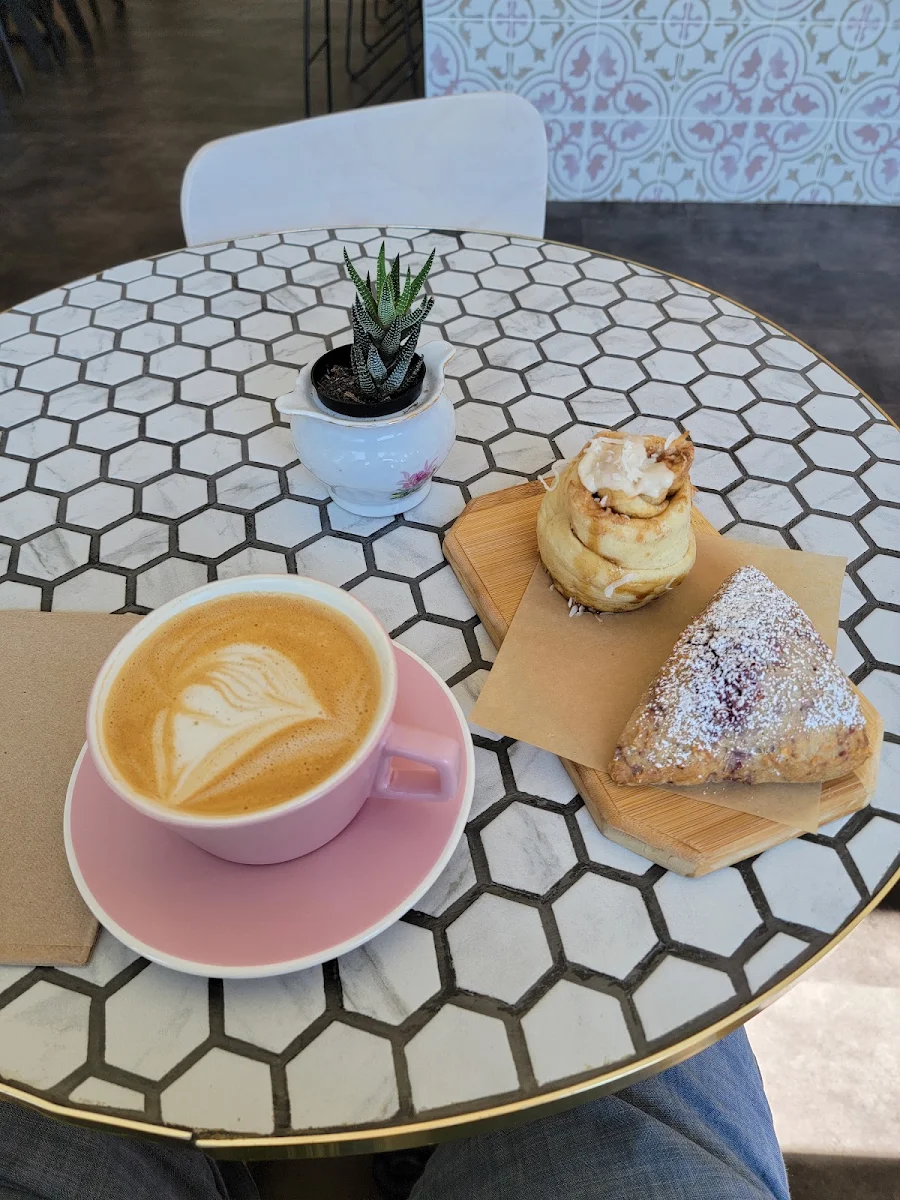 Iluka Bun Raspberry Scone and a Latte with Oat Milk