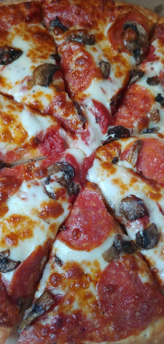 Pepperoni Mushrooms and Extra Cheese Pizza