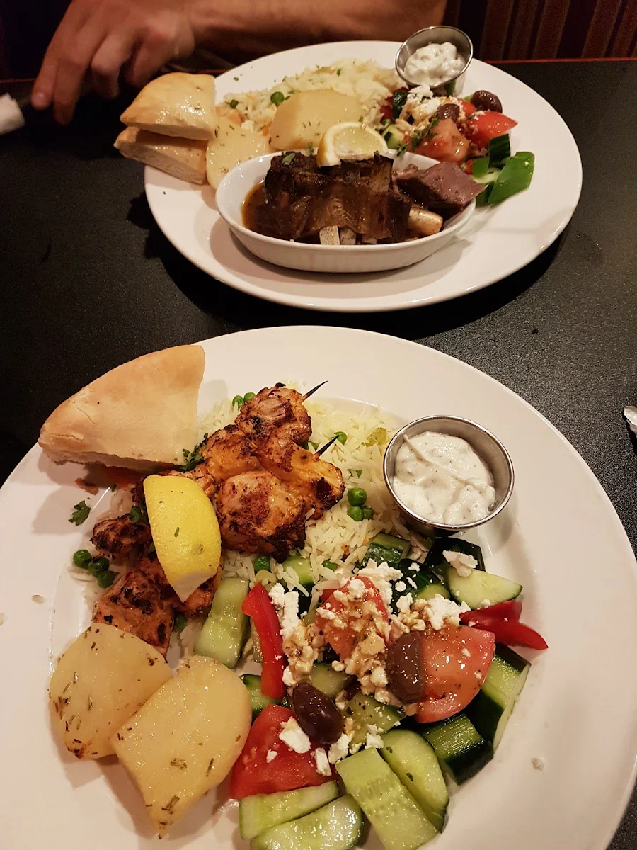 Chicken Souvlaki Halal with Lemon Rice Greek Salad Pita Bread Roasted Potatoes & Tzatziki