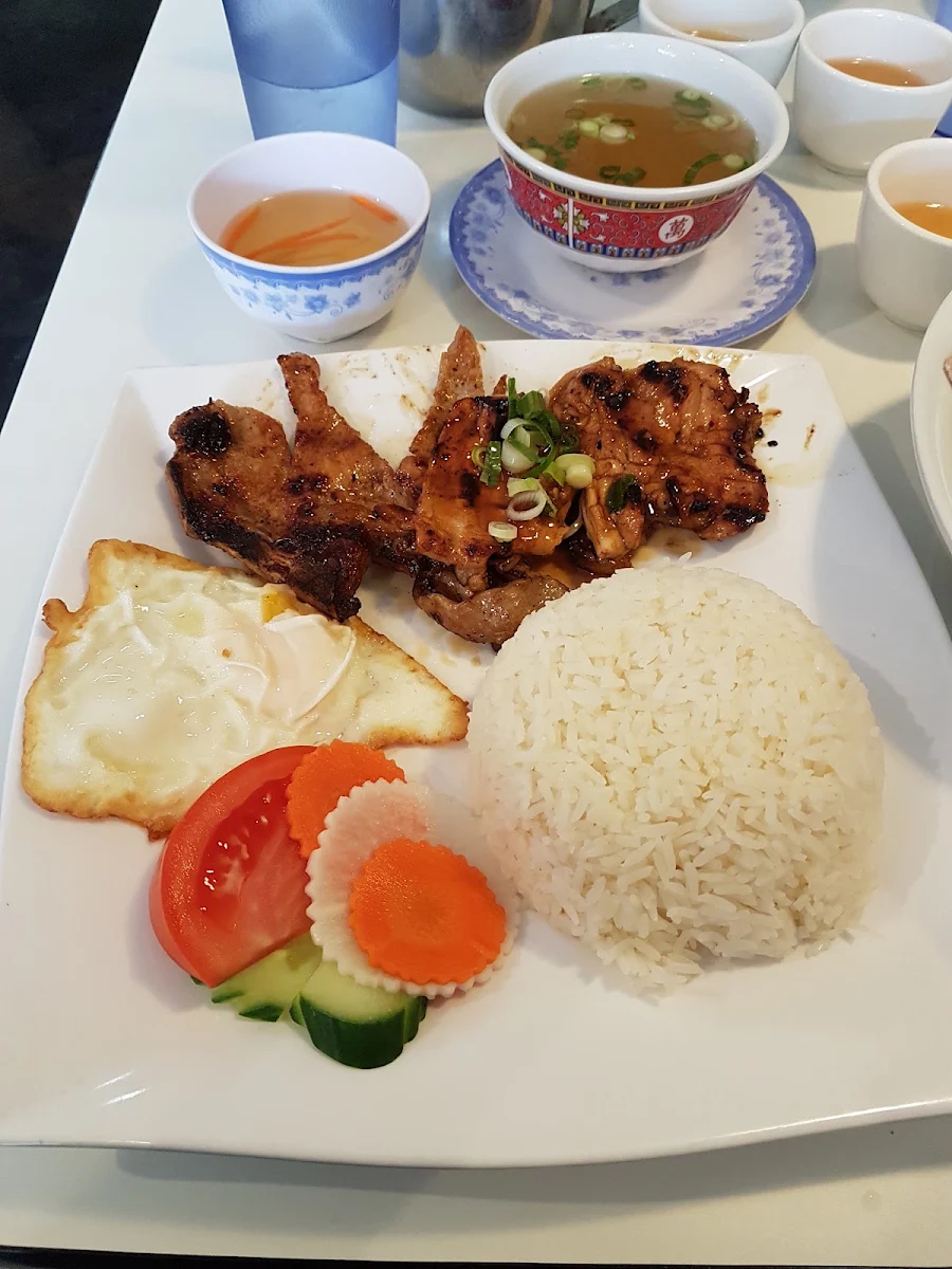 Grilled Pork Chop with Chicken Fried Egg