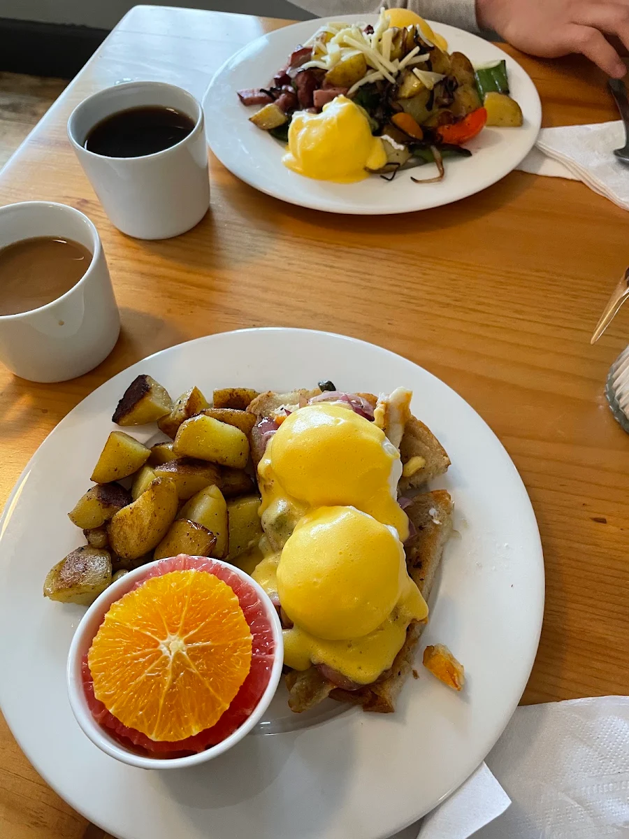 Chorizo Eggs Benedict with House Made Hollandaise and Potato Fries