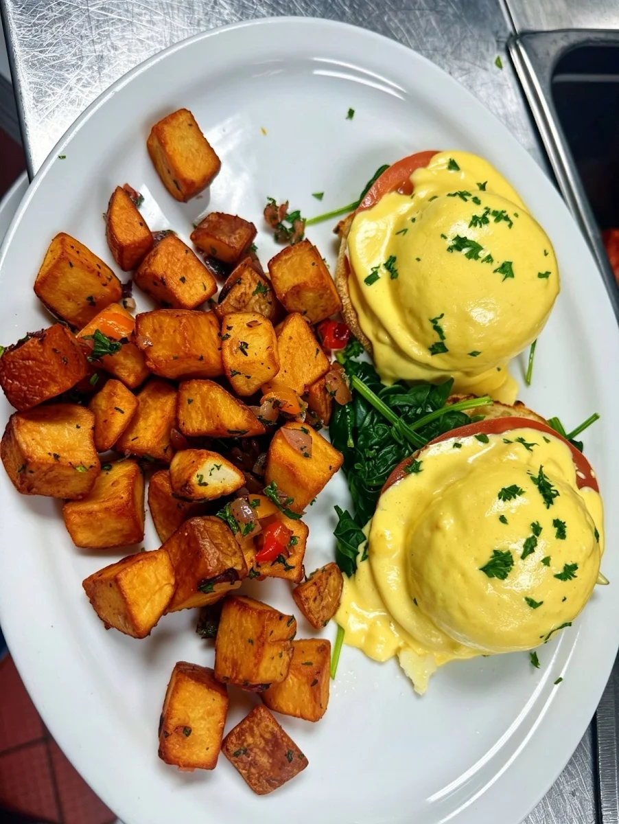Western Benedict with Black Forest Ham Canadian Cheddar and Sautéed Mushrooms
