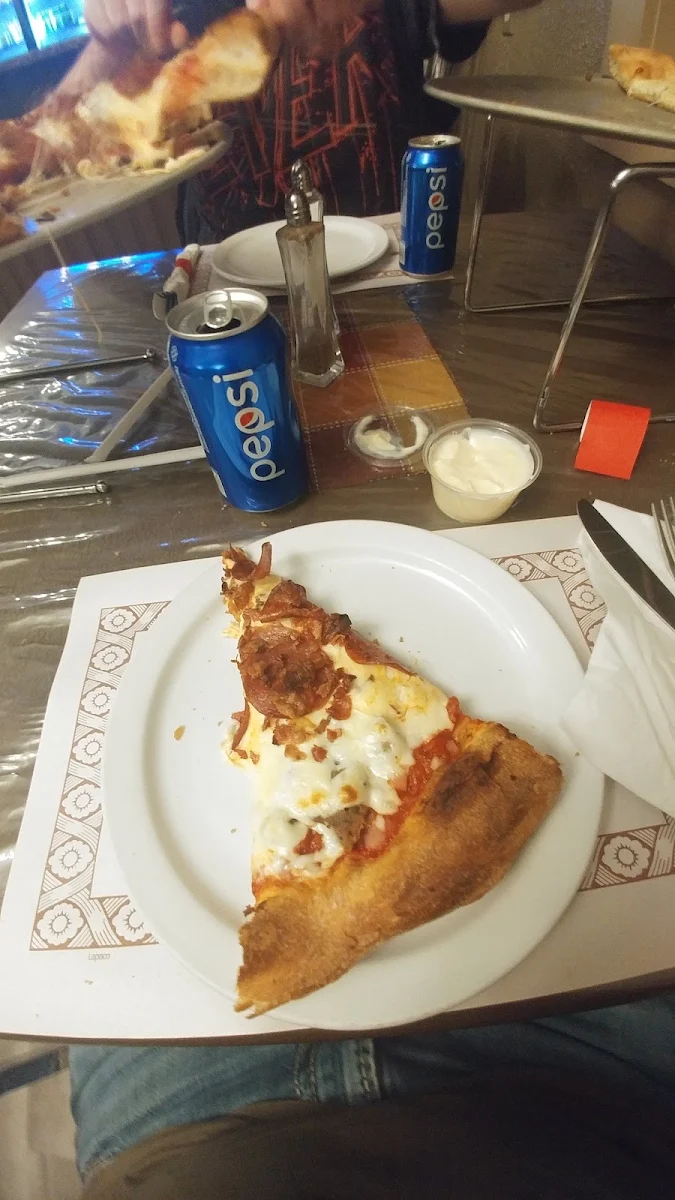 All Meat Pizza by the Slice