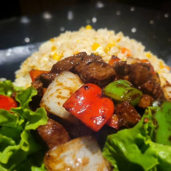 C8. Pan Fried Beef Cube on Fried Rice
