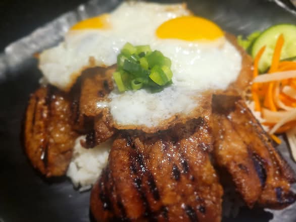 C1. Fried Egg and Grilled Pork chop on stream rice