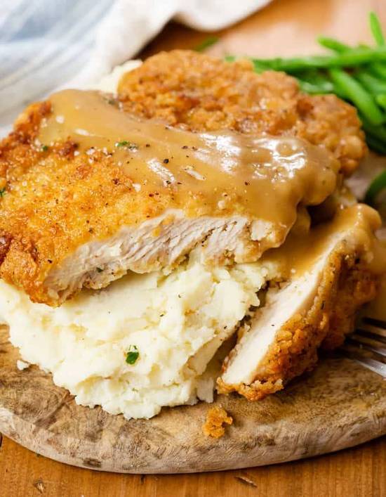 Country Fried Chicken Breast Topped with Gravey
