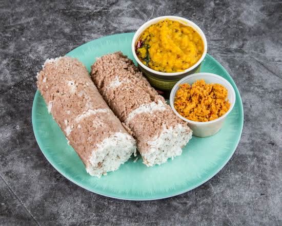 Puttu with red lentils, eggplant curry & coconut sambal