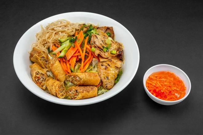 24A - Vermicelli Bowl with grilled sliced pork, shredded pork and pork spring rolls
