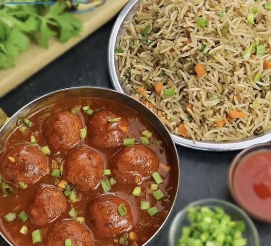 1 Full Veg Manchurian Gravy with Veg Fried Rice/ Veg Noodle+2 Pop