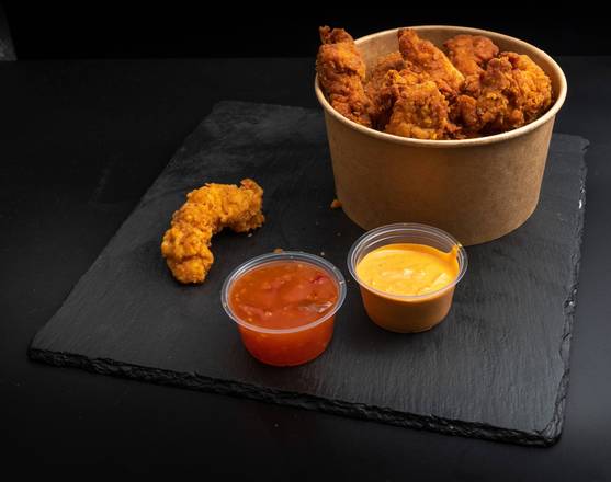 crispy fried chicken bucket with dipping sauce