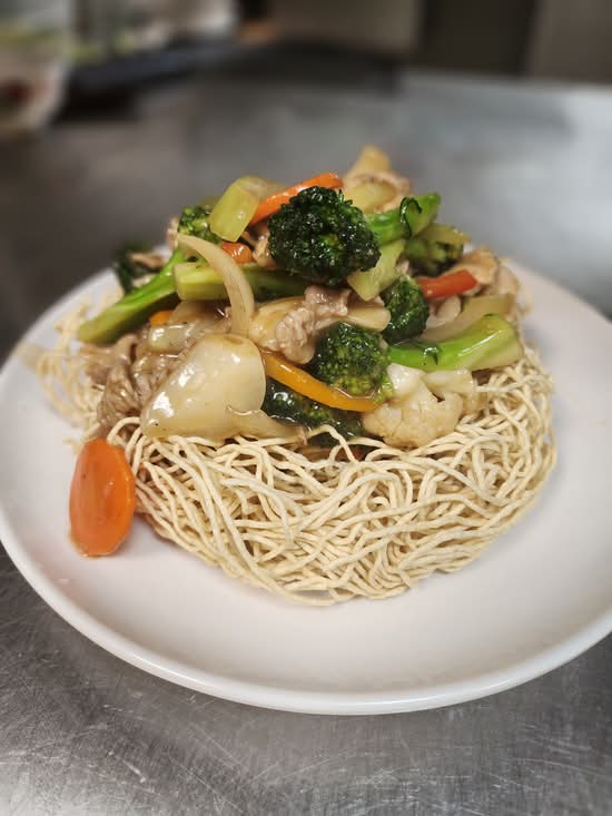 65.   Stir-Fried Beef, Chicken, and Mixed Vegetable on Egg Noodles