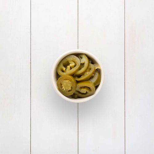 Sliced, pickled jalapeños