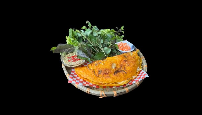 Vietnamese Pancake with pork belly, mushrooms, shrimps, and onions (Banh xeo Viet Nam)