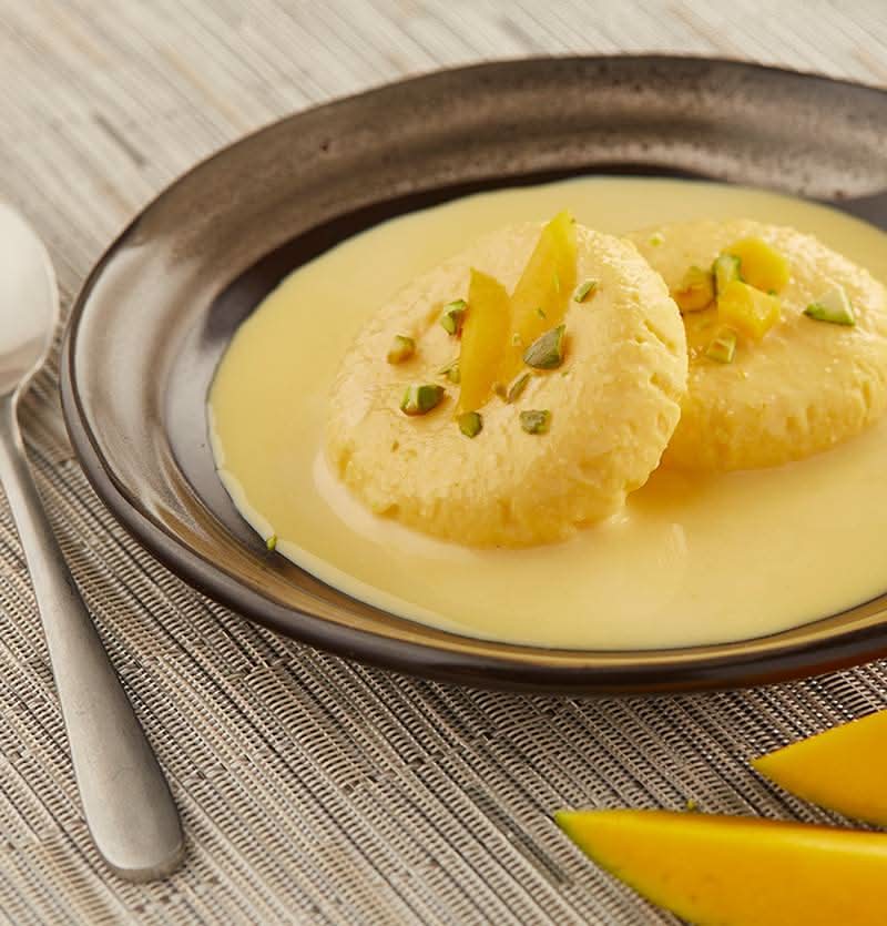 Mango Rasmalai (Topped by tooti frooti)