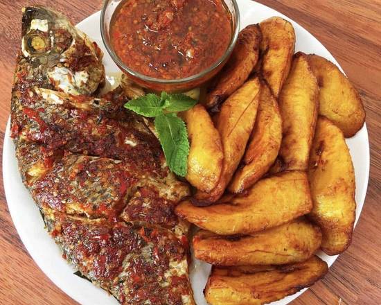 Fried plantains + sauce + Tilapia fish