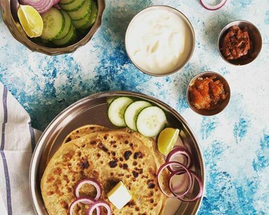 Onion paratha with dahi and achar