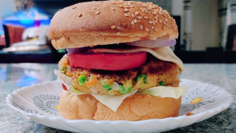 Paneer Noodle Tikki Burger Combo comes with fries & pop