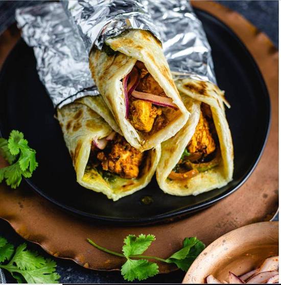 BUY ONE GET ONE FREE Paneer Tikka Kathi Roll comes with a side of masala fries