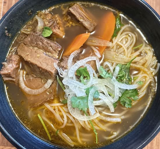 Beef stew with rice noodle in soup