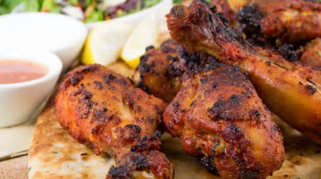jerk chicken with  rice /peas/ coleslaw