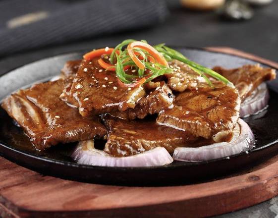 Beef Ribs With Black Pepper On Rice