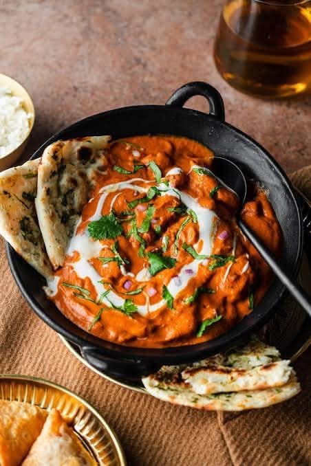 Butter chicken with naan and pop combo