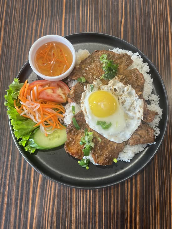 Lemongrass Grilled Pork Chop, Chicken & Fried Egg on Rice (Cơm sườn nướng gà nướng ốp la)