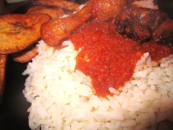 A Plate of White Rice, 2 Pieces of Chicken, and Dodo