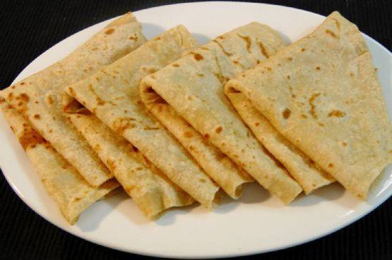 Curry Goat Roti (Dhalpouri)